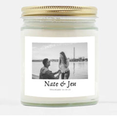 Engagement candle with couple’s names, date, and photo.